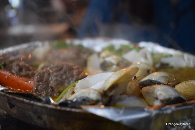 It pops us! The hot plate is ready to be eaten! Hanoi Street Food