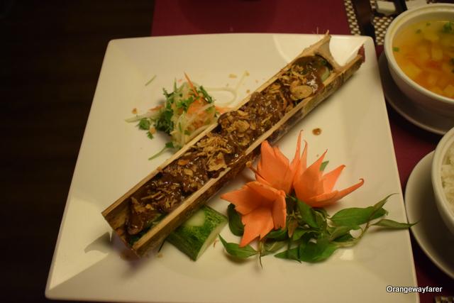 Meat smoked in Bamboo stem. An authentic Vietnamese food.