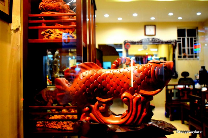 A wooden fish spotted at one of the old shops at the alleys of Hanoi Old Quarter