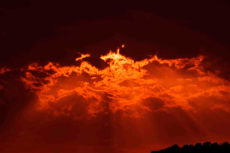 Things to do in dandeli: watch a stunning sunset over the Kali river near Supa dam.