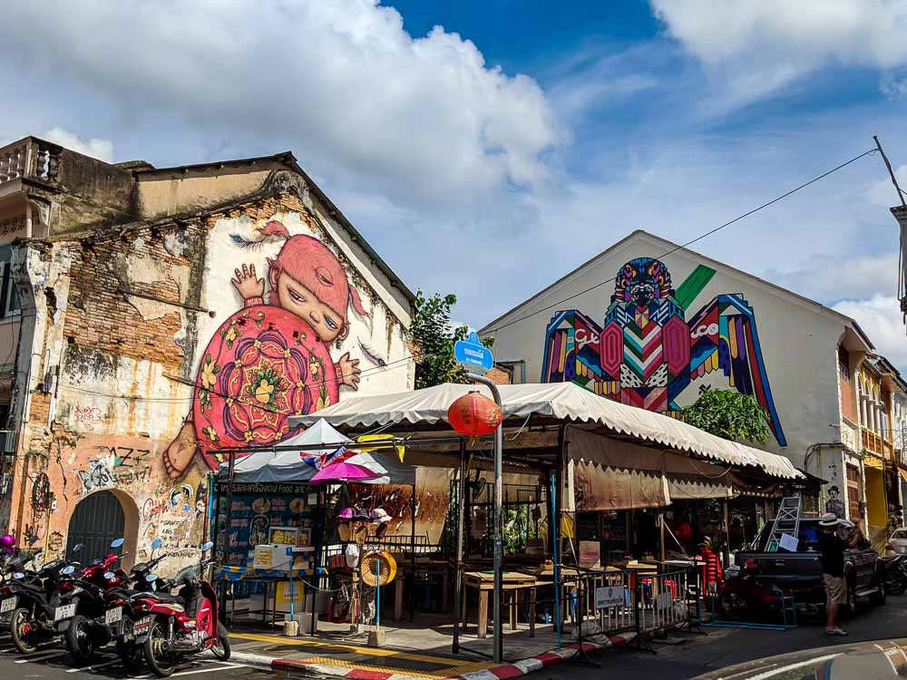 Best Street art by Alex Face in Old Phuket Town, Thailand. Baby Mardi painted by Alex. 