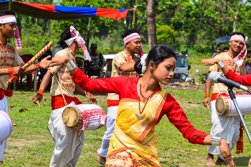 Woman performing Bihu dance at the Manas National Park, Assam