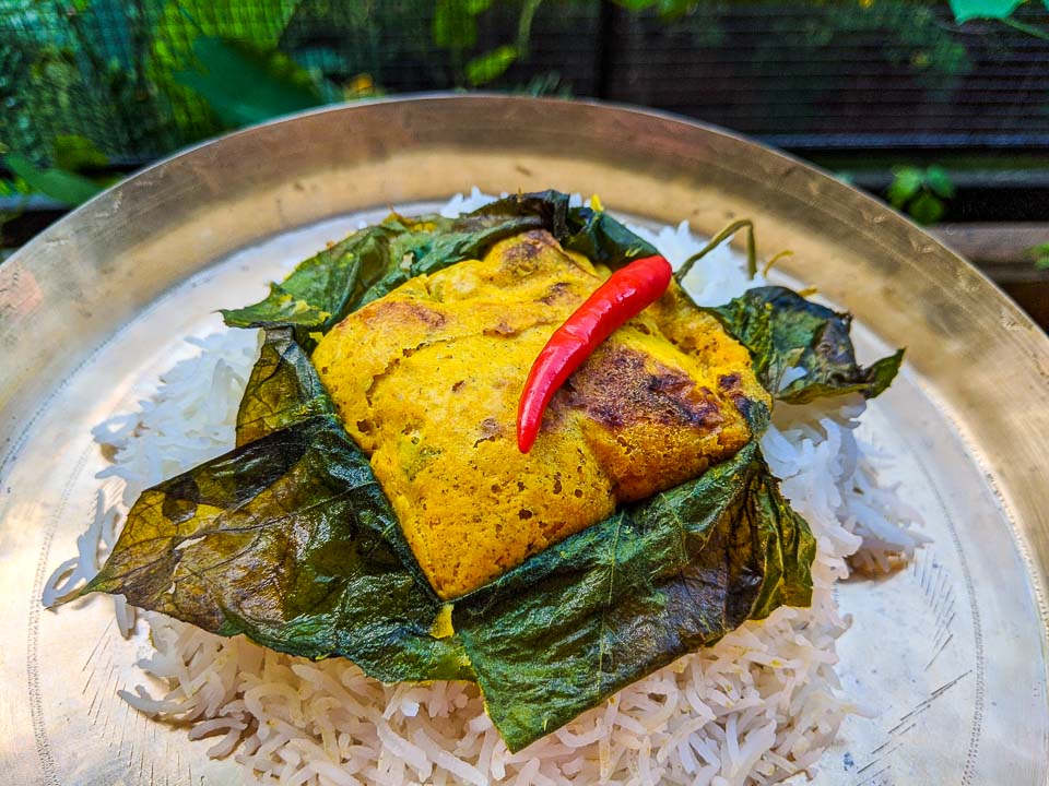 Lau Patay Mora Macher Dimer Paturi: Fish roe steamed in Gourd Leaves