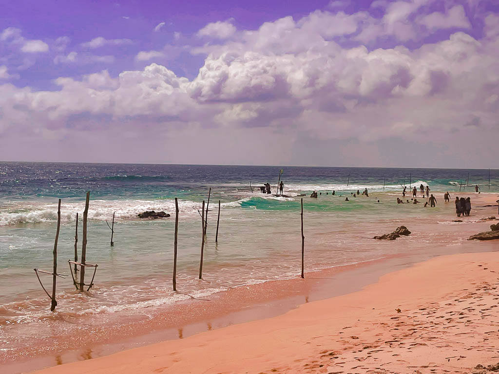 Stilt fishermen sticks of Sri Lanka during a sunny day